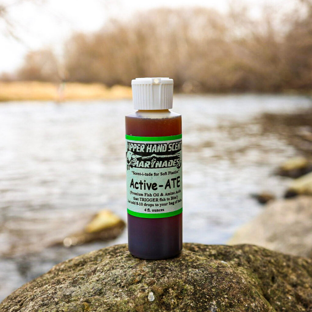 Bottle of Upper Hand Scents liquid fishing scent. Activ-ATE